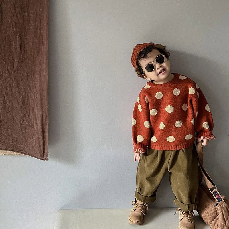 Kids polka-dot knit jumper with long sleeves and ribbed cuffs