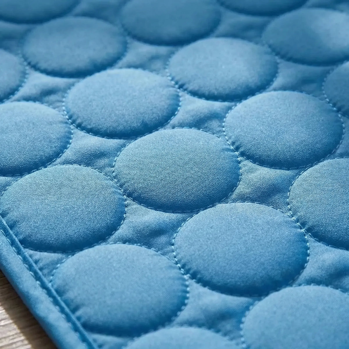 Quilted cooling mat for pets with breathable pebble-pattern surface