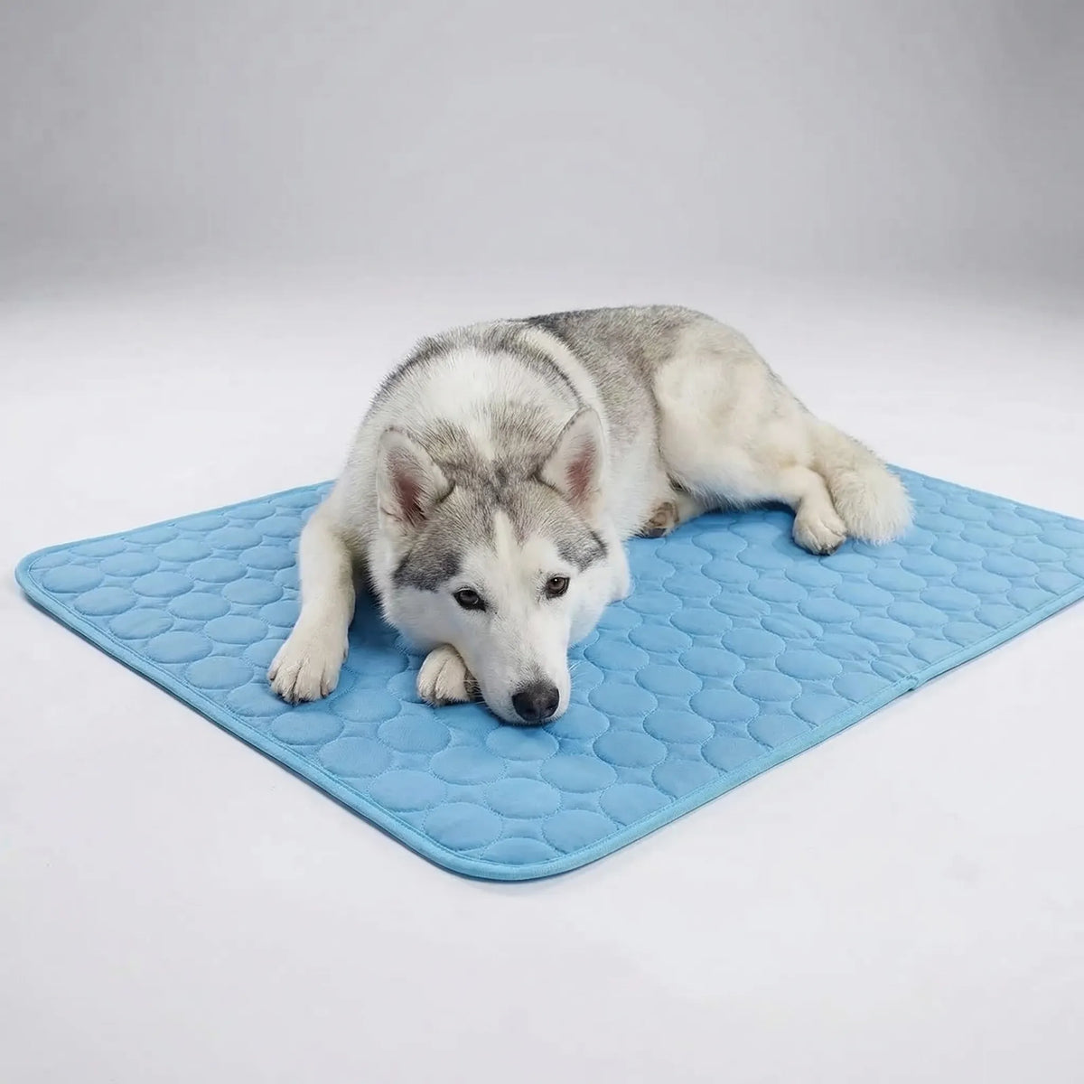Quilted cooling mat for pets with breathable pebble-pattern surface