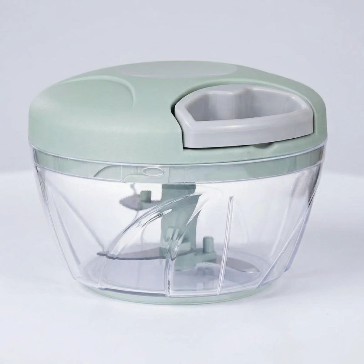Manual food chopper with non-slip grip for garlic and vegetables
