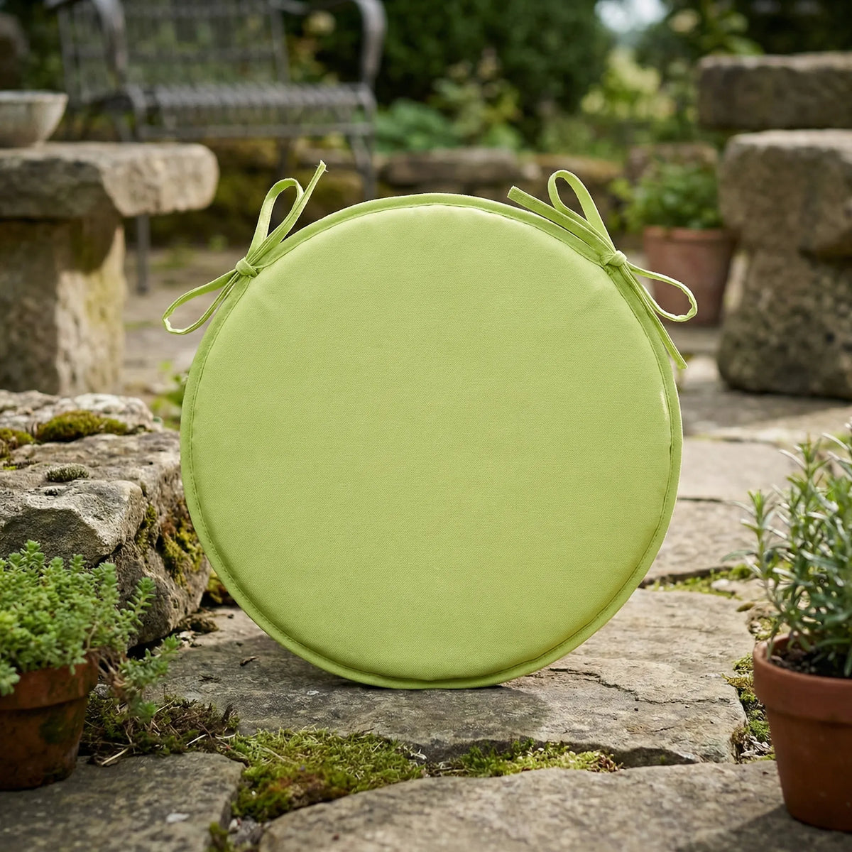 Round seat pad with attachment straps for dining and garden chairs