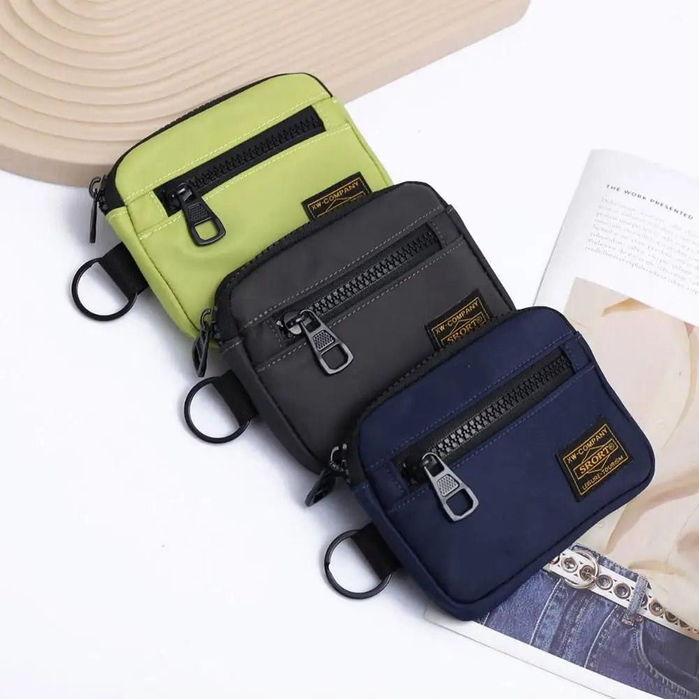 Compact zipper coin pouch with key ring attachment and front pocket