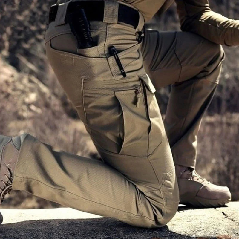 Tactical cargo trousers with multiple pockets and water-repellent finish