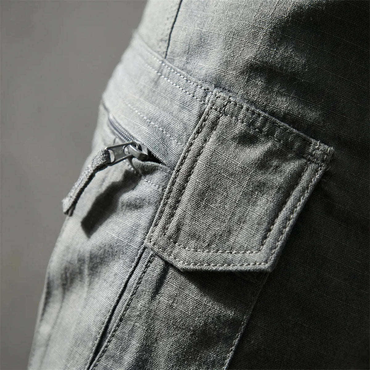 Tactical cargo trousers with multiple pockets and water-repellent finish
