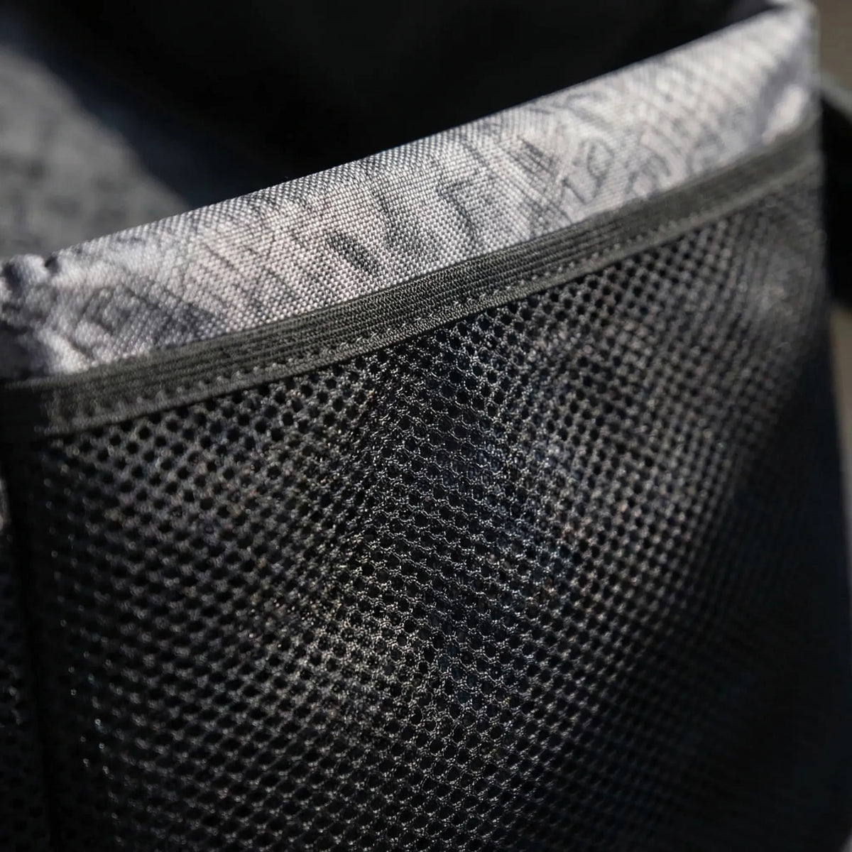 Collapsible bike front pet carrier with mesh panels and suspension