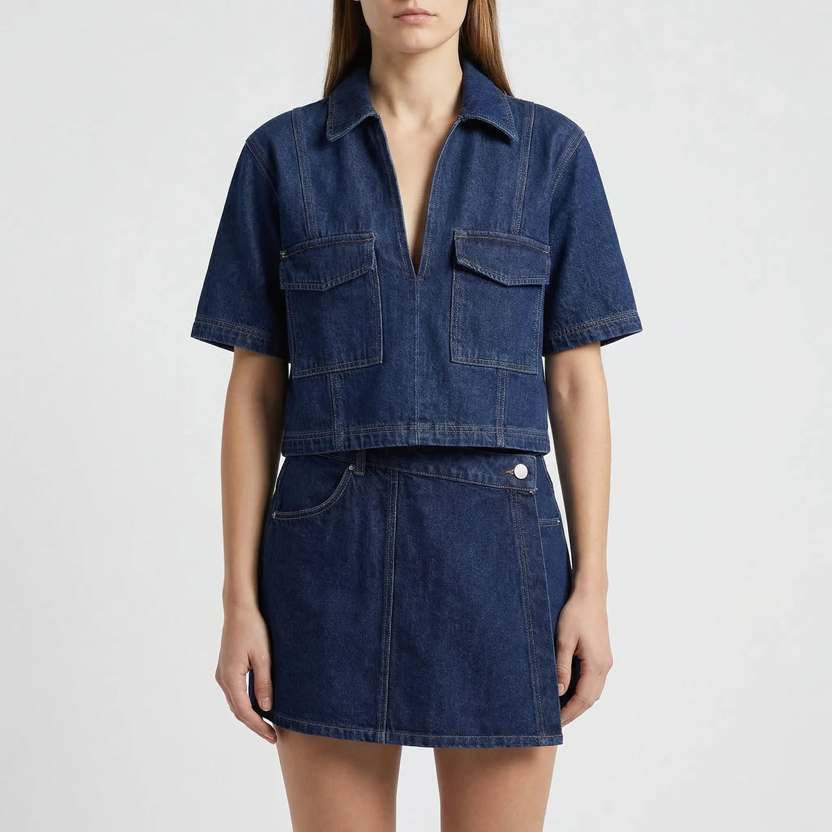 Women's denim co-ord set with cropped top and asymmetric mini skirt