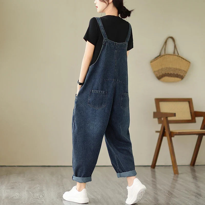 Relaxed fit denim dungarees with harem-style legs and patchwork panel details