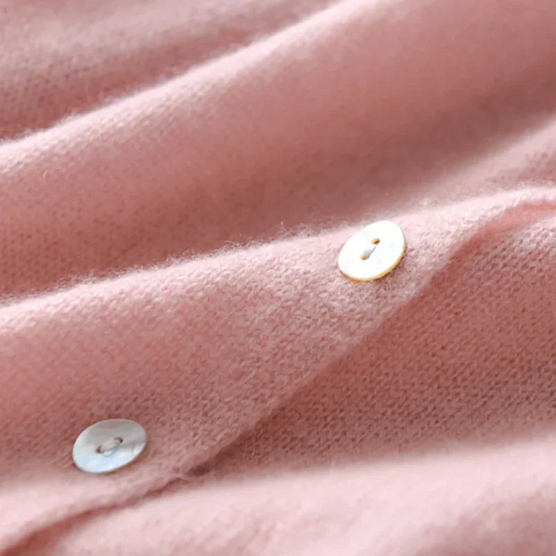Button front knitted cardigan with asymmetric detail and relaxed fit