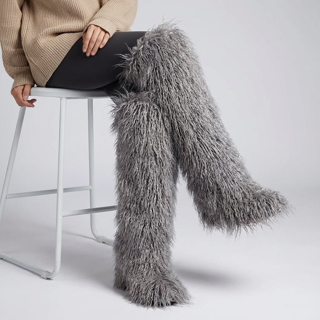 Over-the-knee plush winter boots with slip-on design and platform sole