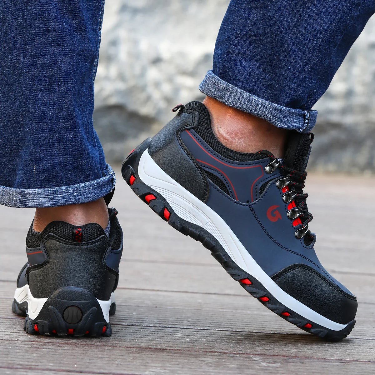 Low profile safety sneakers with reinforced toe protection and high traction sole