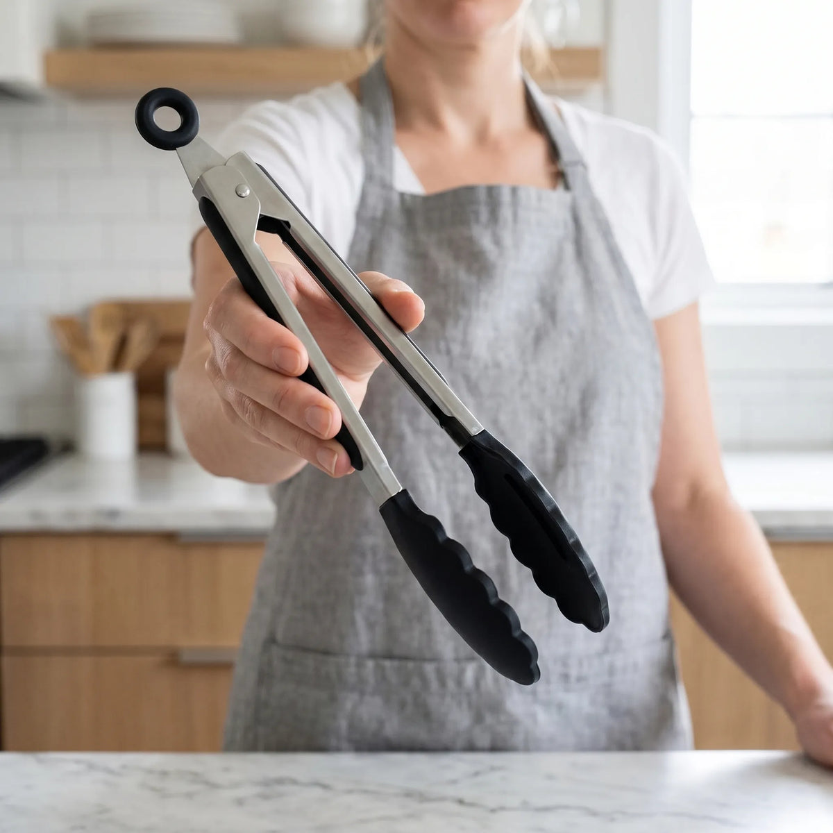 Kitchen tongs with scalloped head non-slip grip and locking storage