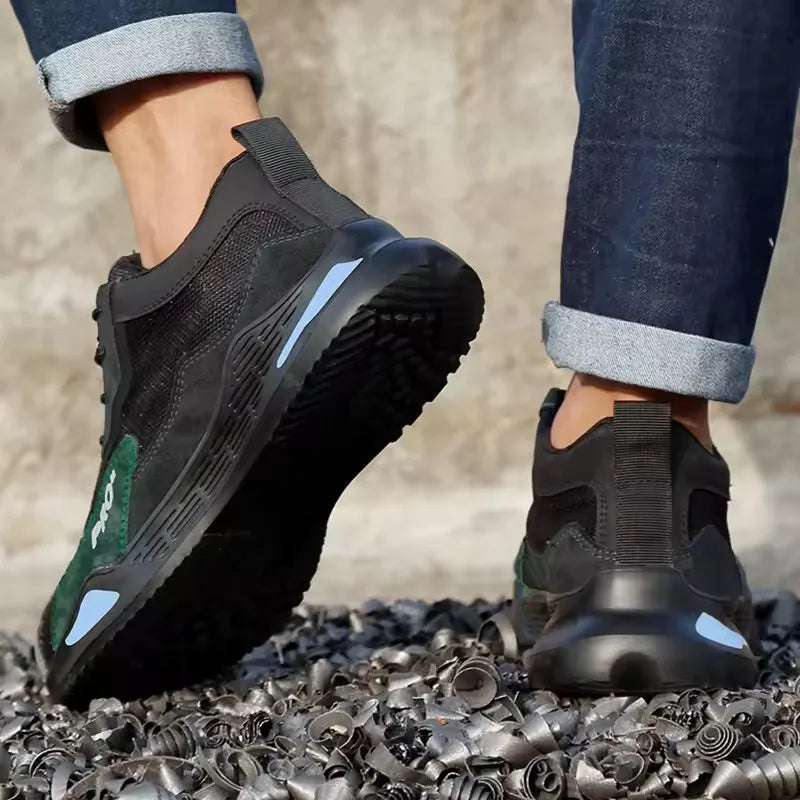 Low profile safety sneaker with reinforced toe protection and breathable mesh