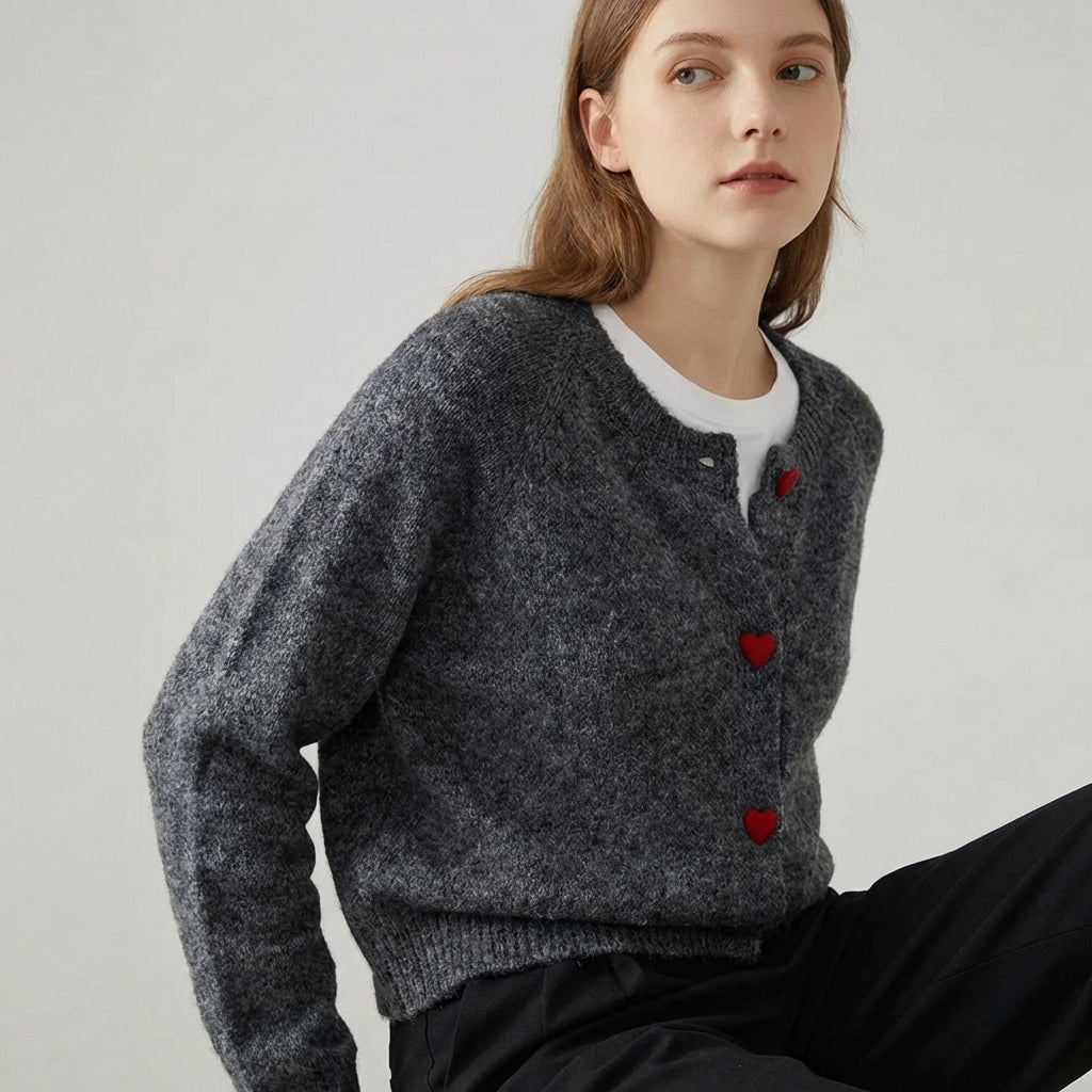 Deep grey chunky knitted cardigan with dropped shoulder sleeves and heart buttons