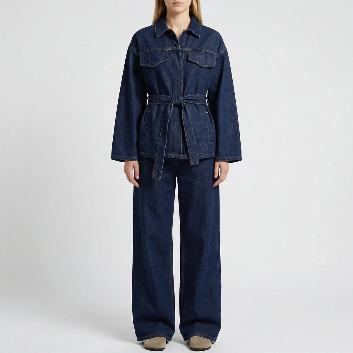 Women's denim co-ord set with belted jacket and wide-leg pants in indigo wash