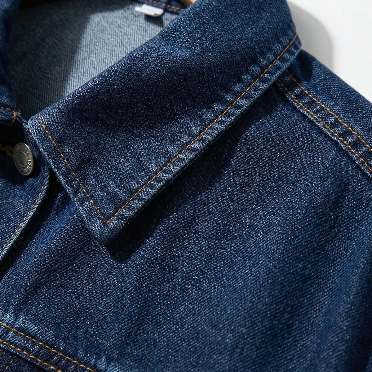 Women's denim co-ord set with belted jacket and wide-leg pants in indigo wash