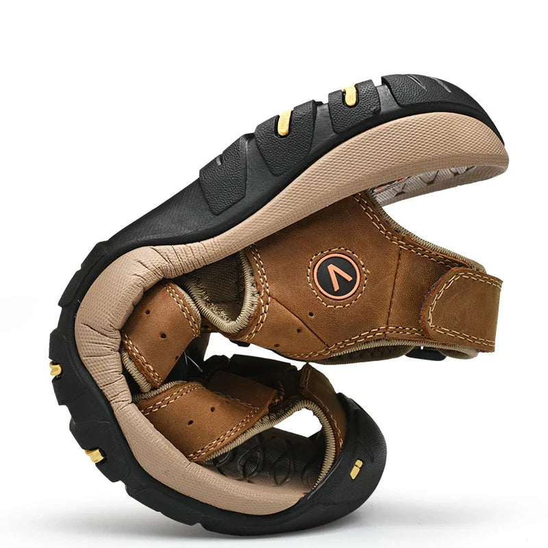 Men's closed-toe outdoor sandal with bungee lacing and ventilated sides