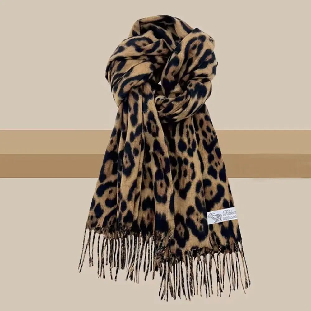 Leopard print knit shawl with tassel detailing warm winter wrap