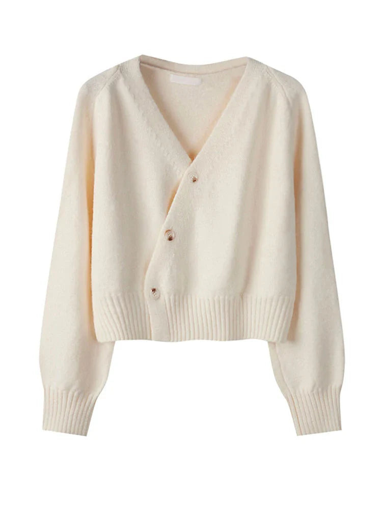 Women's asymmetrical knit cardigan with relaxed fit and cropped length