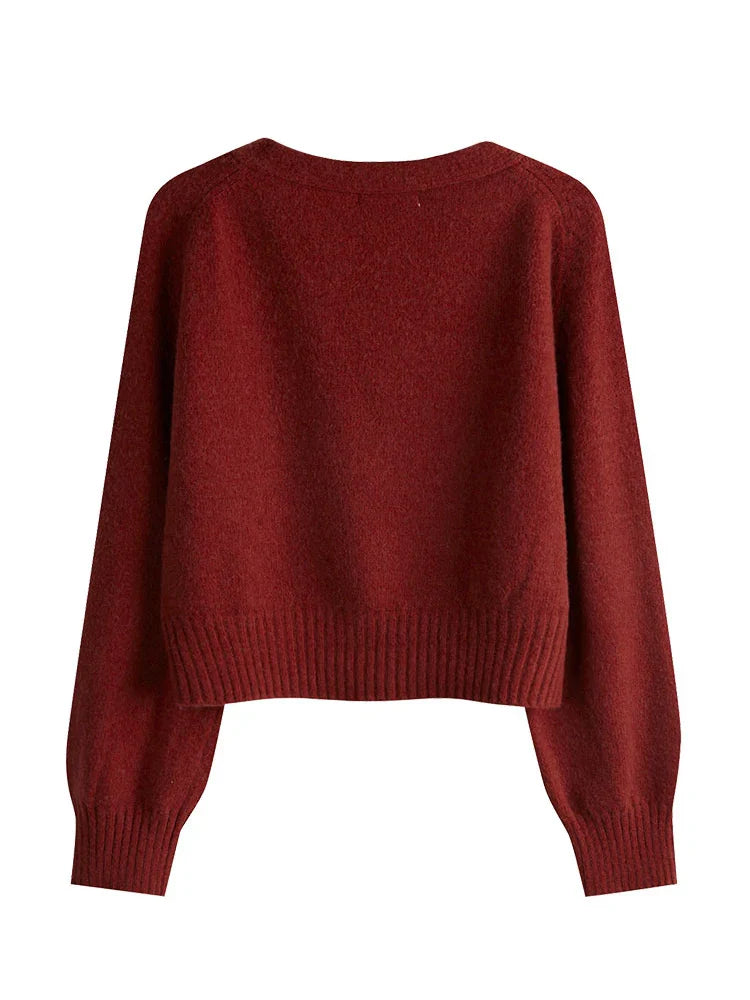Women's asymmetrical knit cardigan with relaxed fit and cropped length