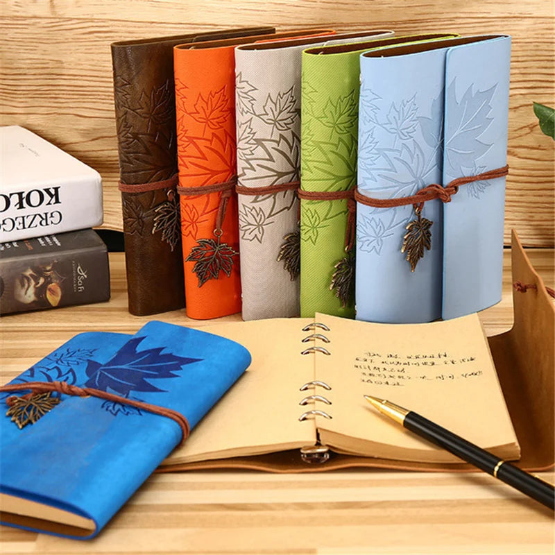 Vintage travellers notebook with refillable loose leaf pages and wraparound closure