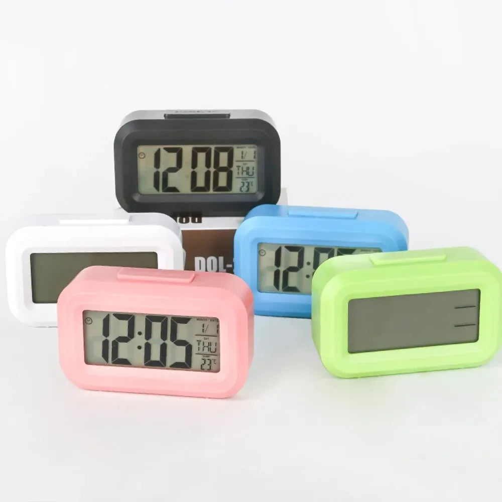 Digital LED alarm clock with battery power and temperature display