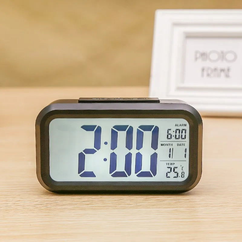 Digital LED alarm clock with battery power and temperature display
