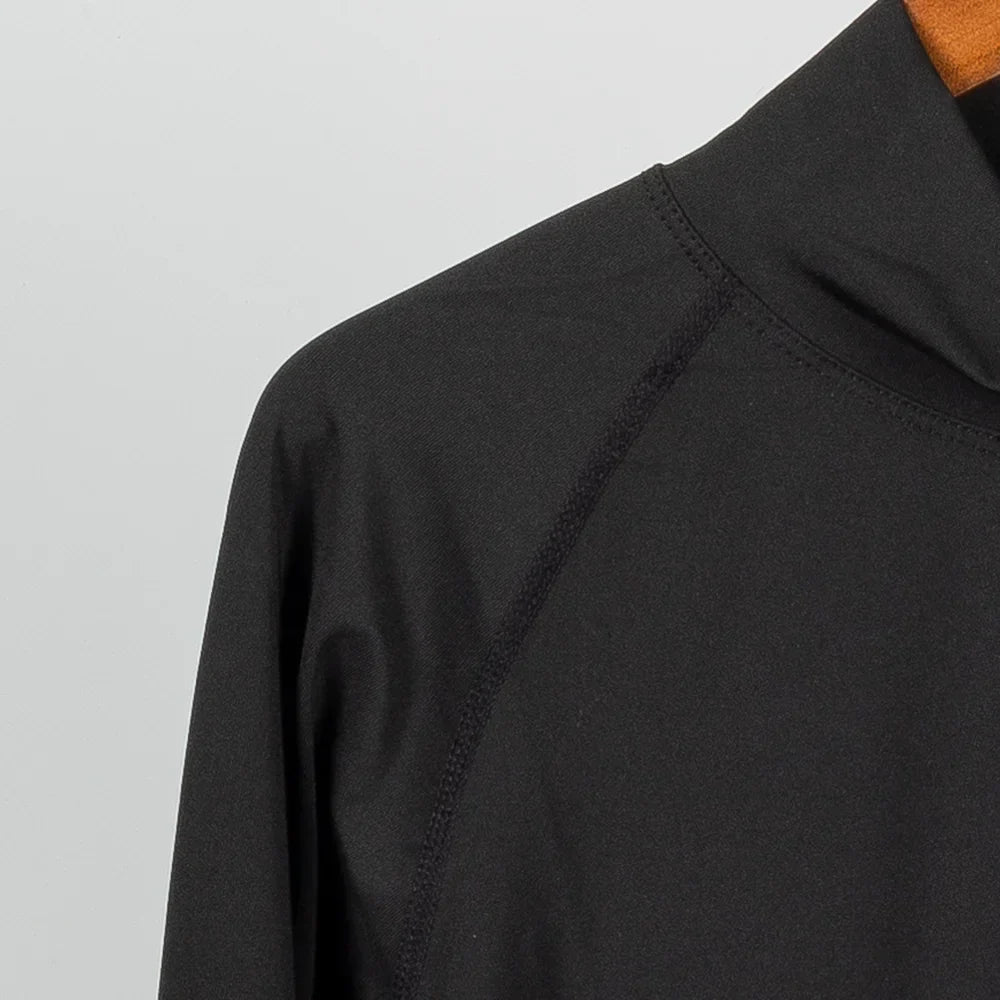 Men's fitted training top with mock neck and moisture wicking