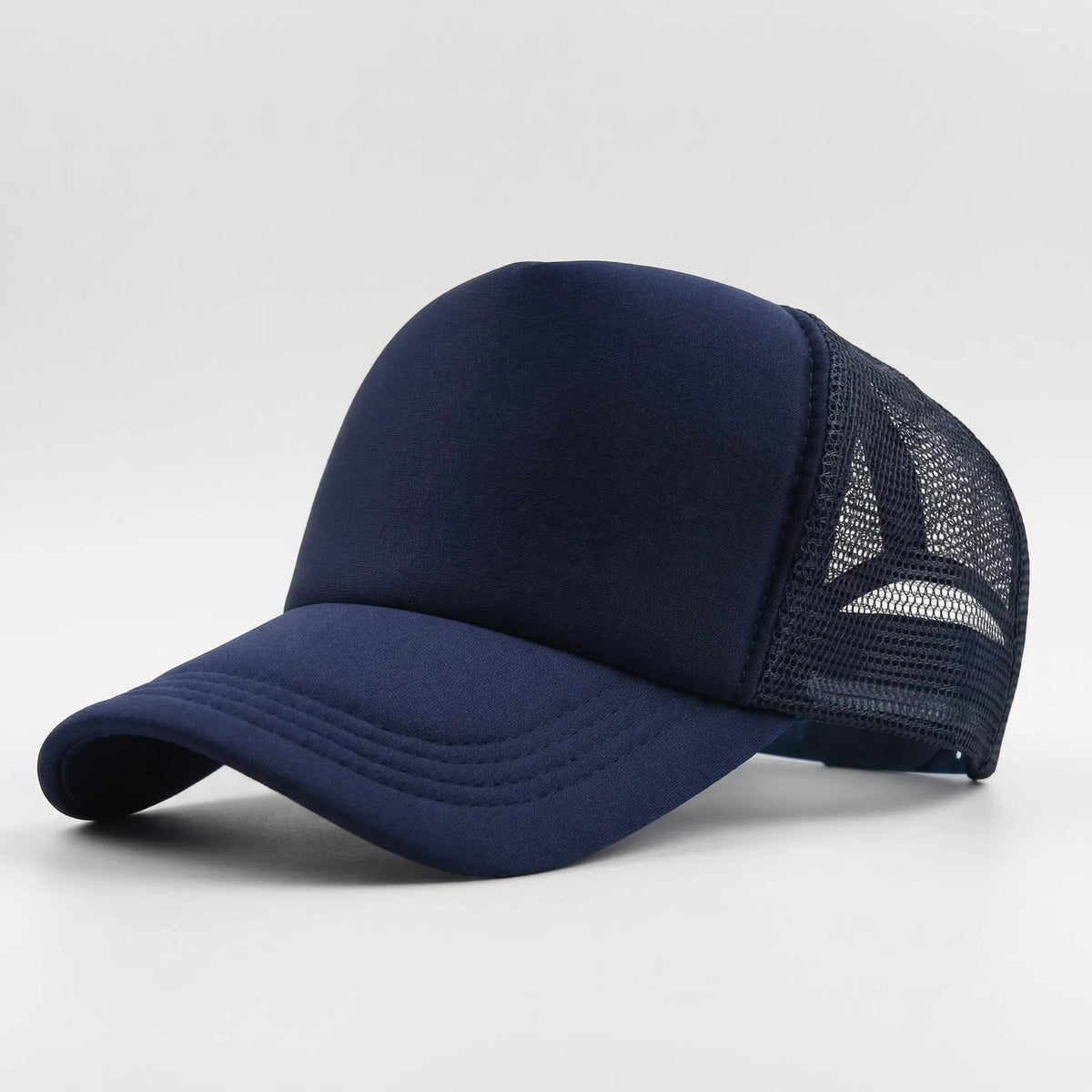Plain mesh trucker cap with breathable back panel and snapback closure