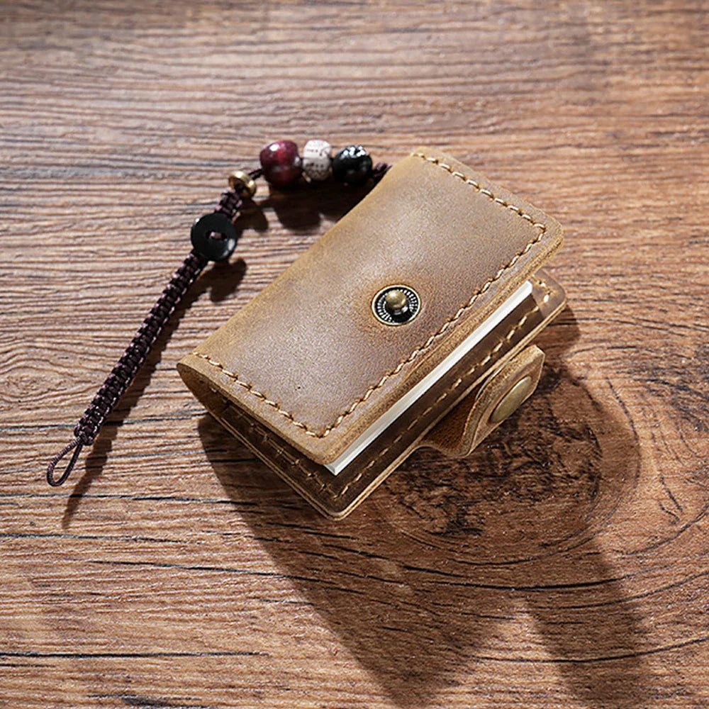 Mini pocket notebook with vintage retro finish and snap closure