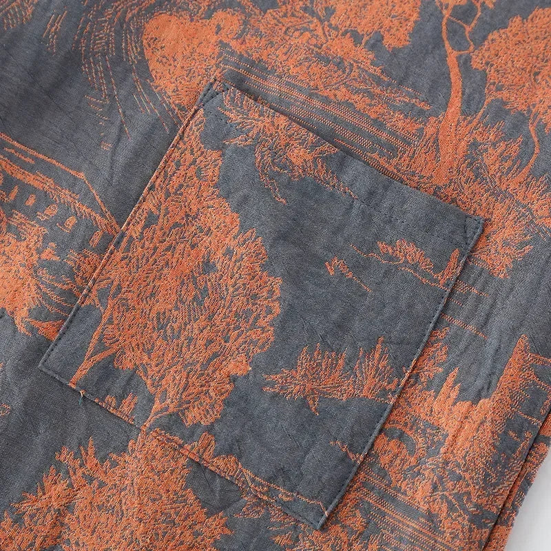 Lightweight kimono style robe with scenic printed design and breathable woven construction