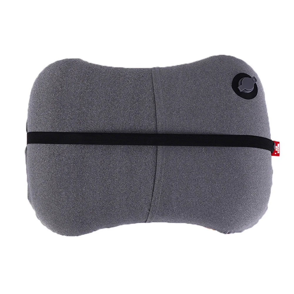 Portable inflatable travel pillow with ergonomic neck support and soft quilted surface