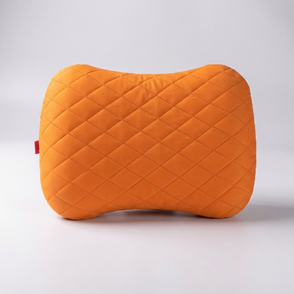 Portable inflatable travel pillow with ergonomic neck support and soft quilted surface