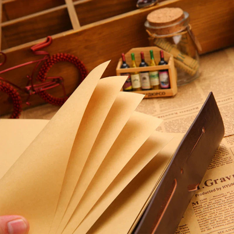 Compact refillable travel journal with vintage embossed compass design
