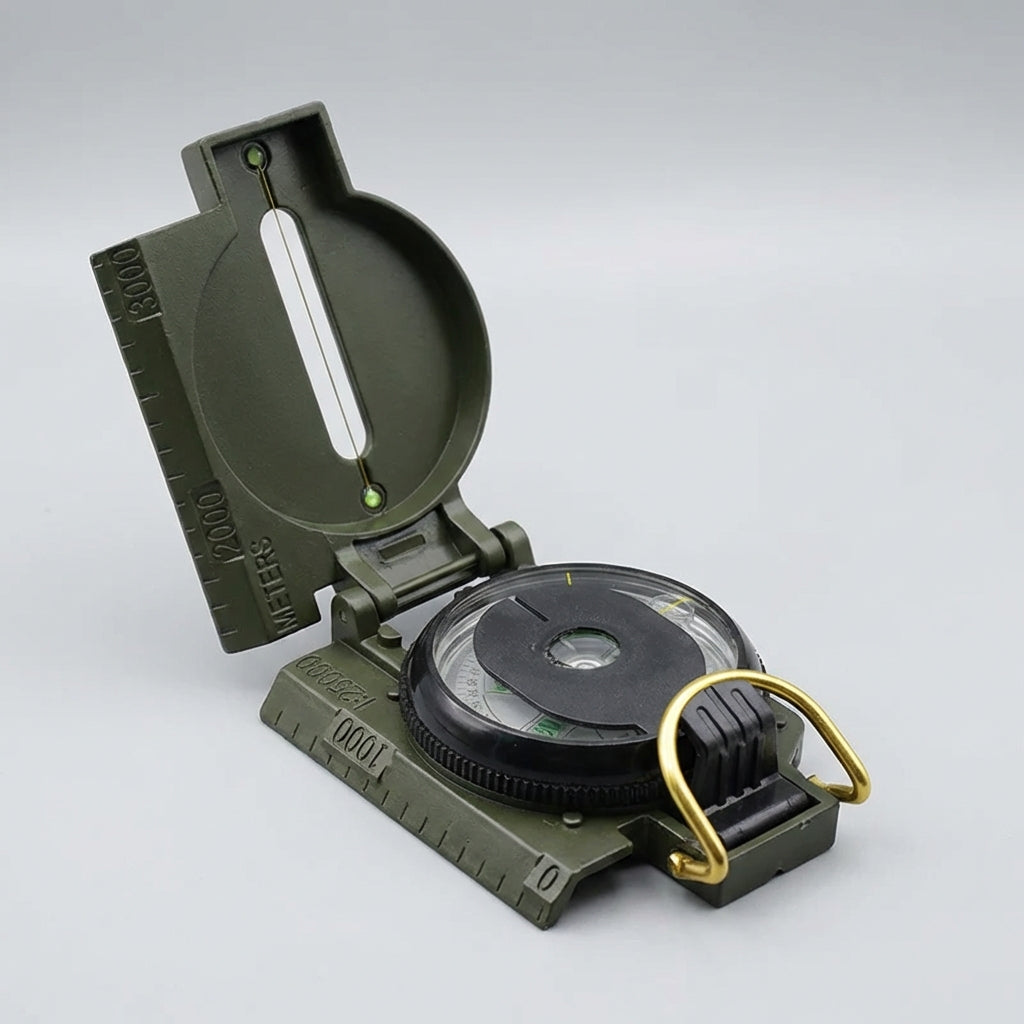 Compact folding sighting compass with water-resistant construction and integrated map scales