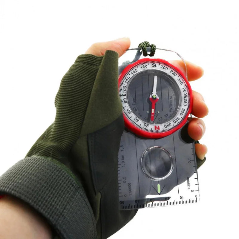 Baseplate field compass with luminous dial and map scales