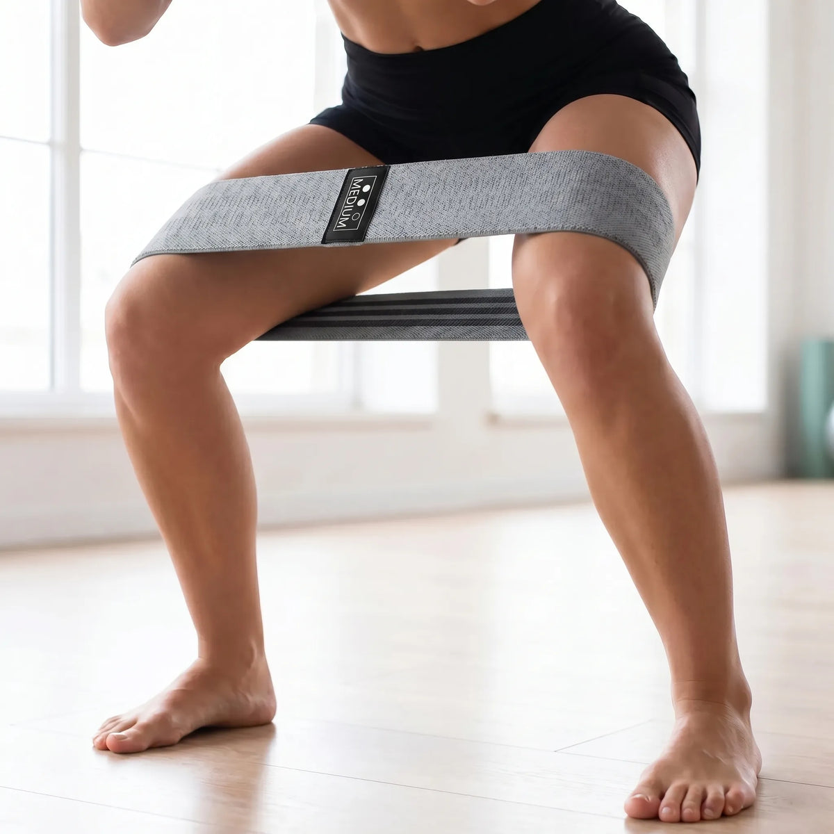 Long fabric resistance band with continuous loop design for full body workouts