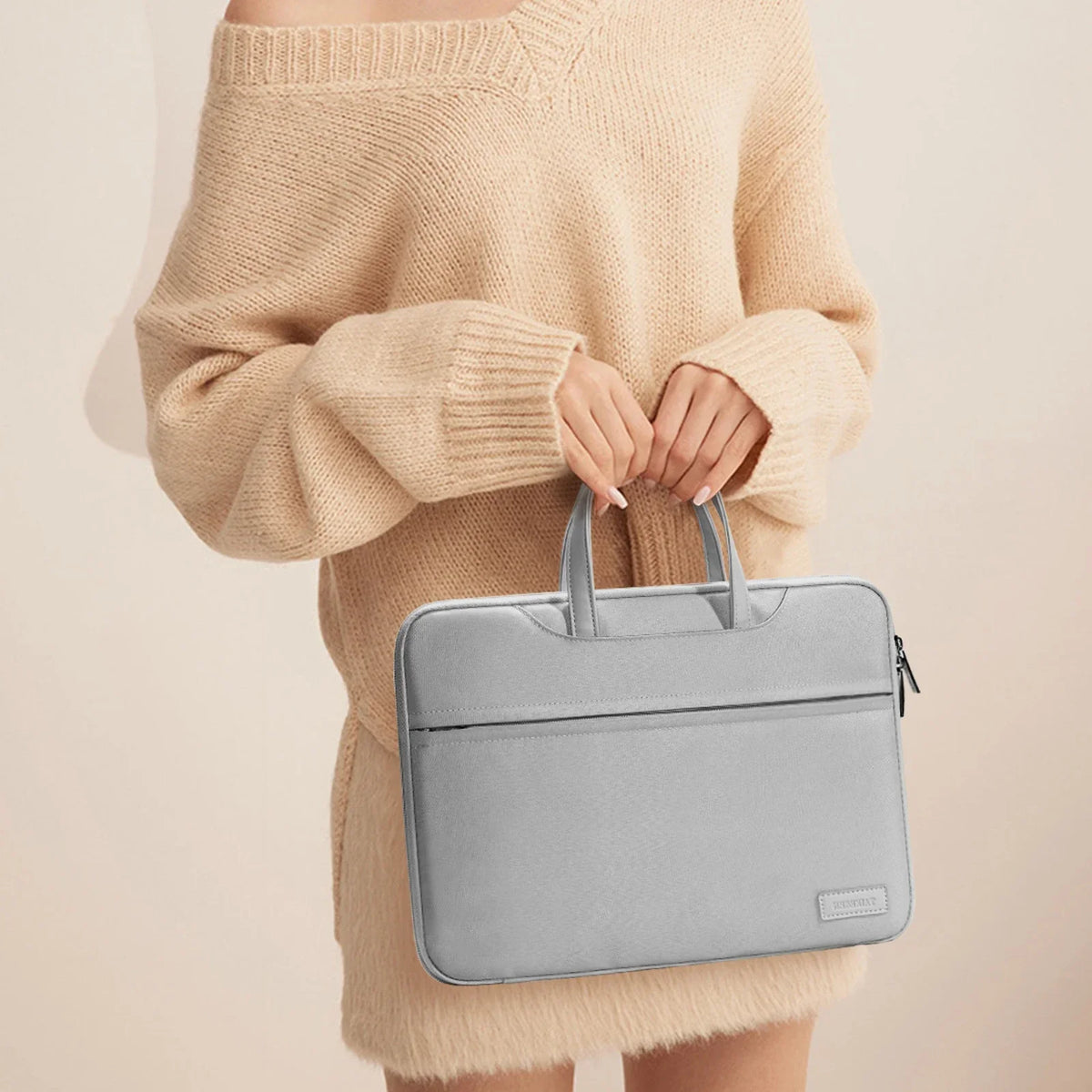 Padded laptop briefcase with mesh pockets and water-resistant nylon