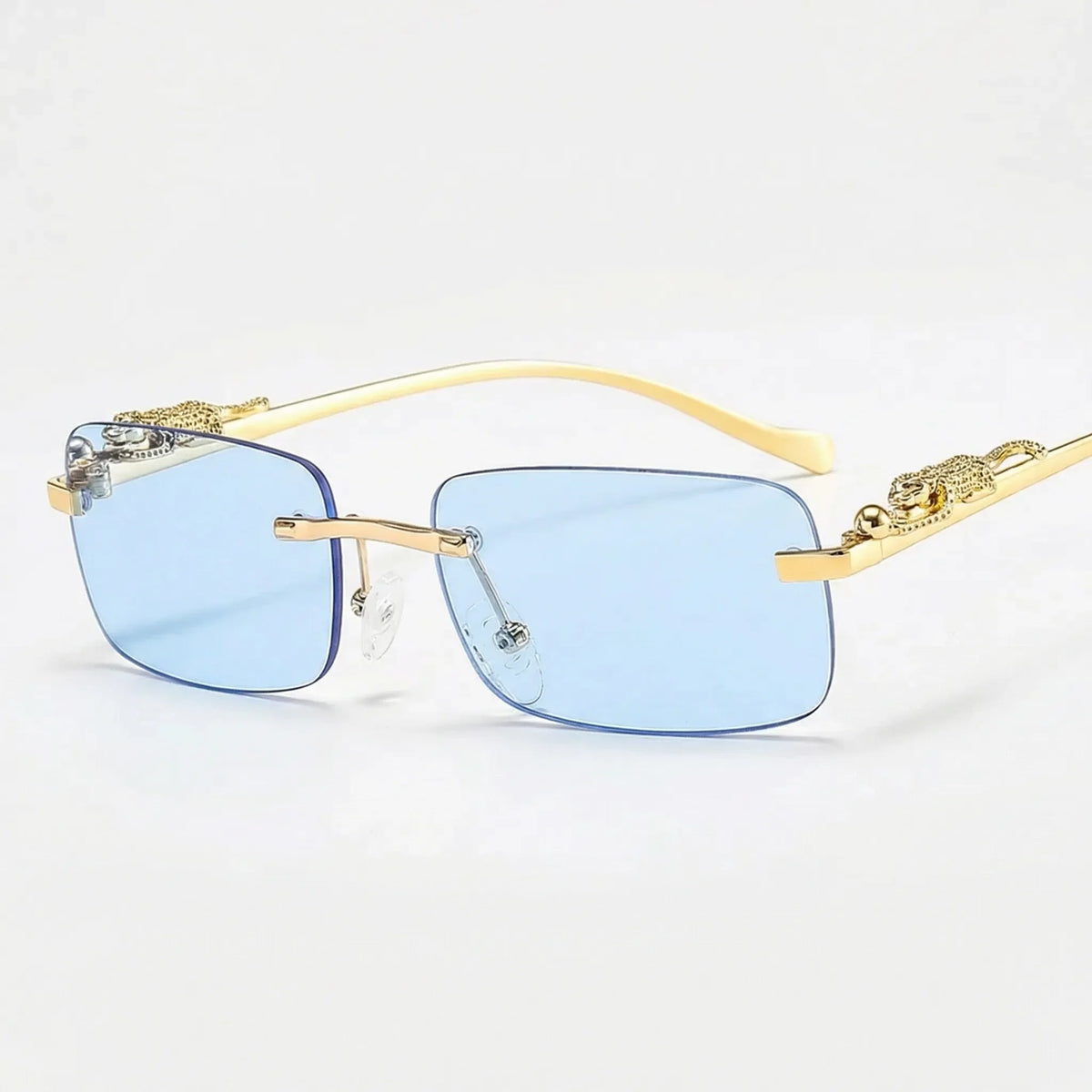 Rimless square sunglasses with leopard gold temple detail and adjustable nose pads