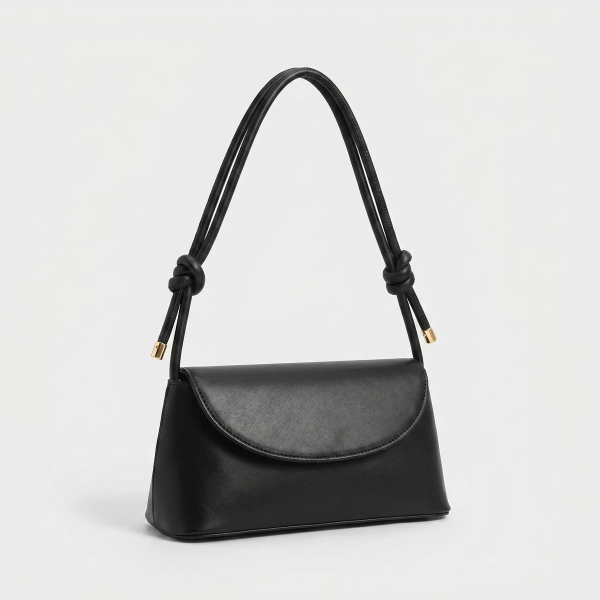 Compact square shoulder bag with knotted strap and flap closure