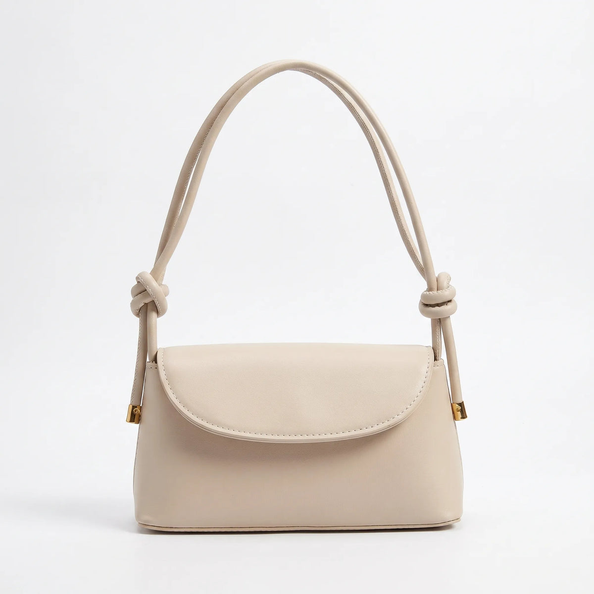 Compact square shoulder bag with knotted strap and flap closure
