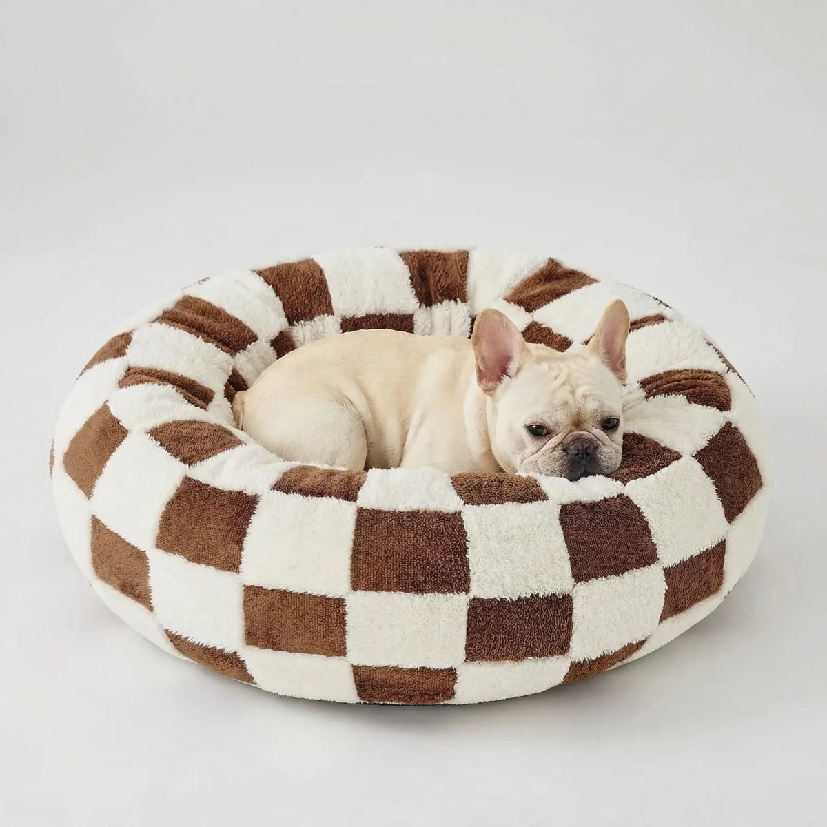 Round plush dog bed for small dogs with raised bolster edge non-slip