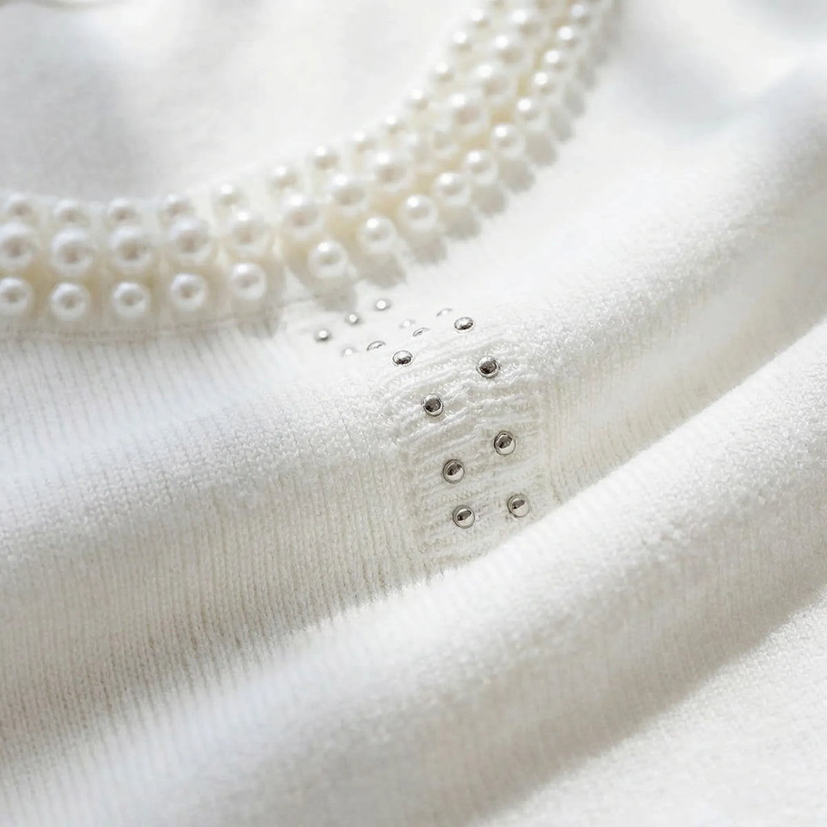 Sleeveless knitted vest with pearl trim hem and stud-embellished straps