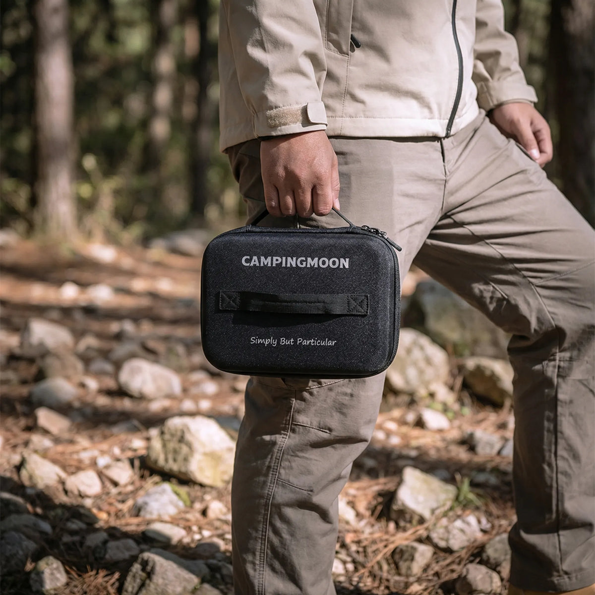 Square insulated lunch carrier with impact-resistant shell and zippered closure