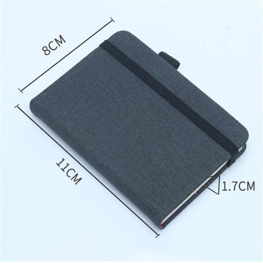 A7 portable coil notebook with blank pages and elastic closure
