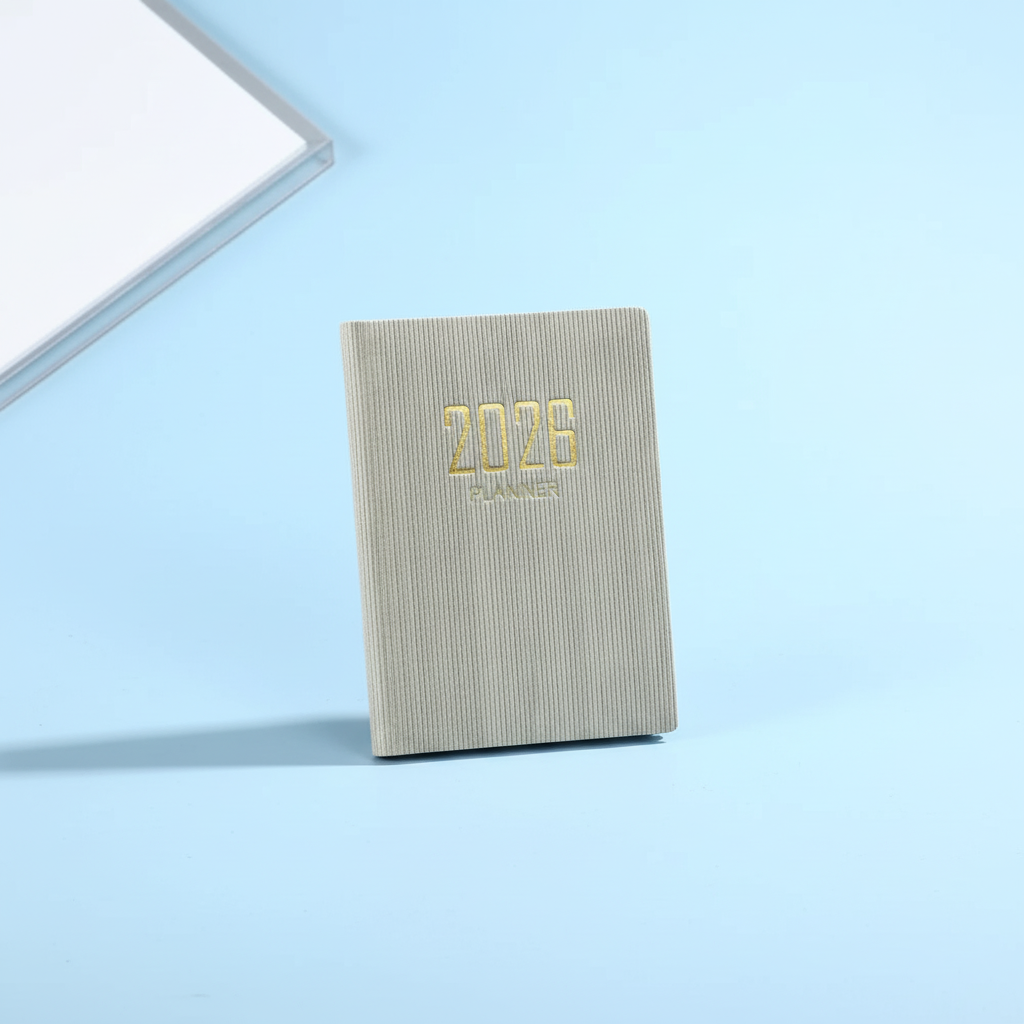 Compact pocket weekly planner with dated pages and mini calendars