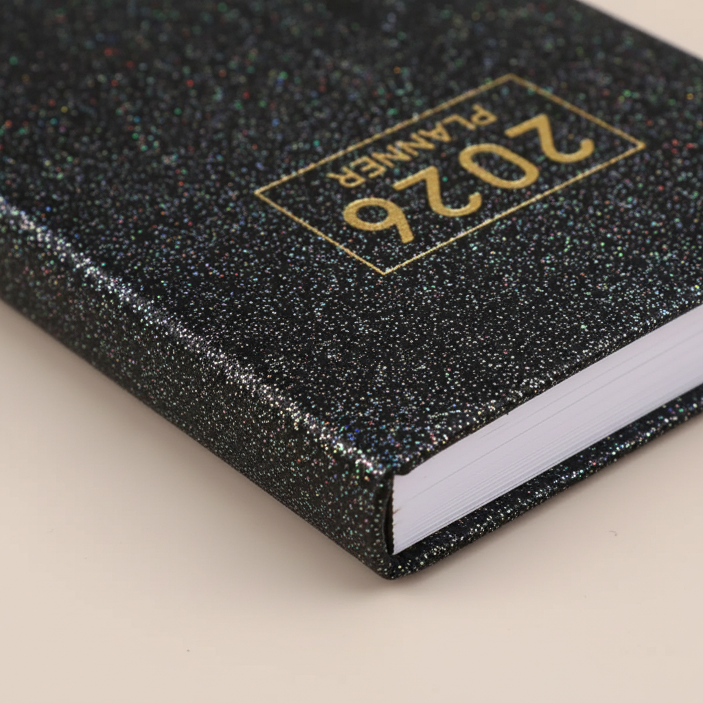 Compact pocket weekly planner with dated pages and mini calendars