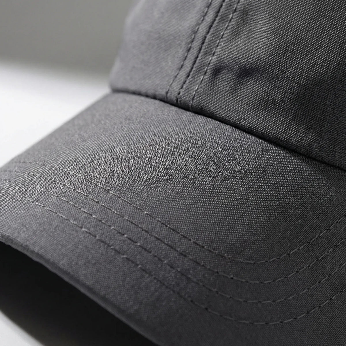 Women's sports cap with ponytail opening and duck bill peak