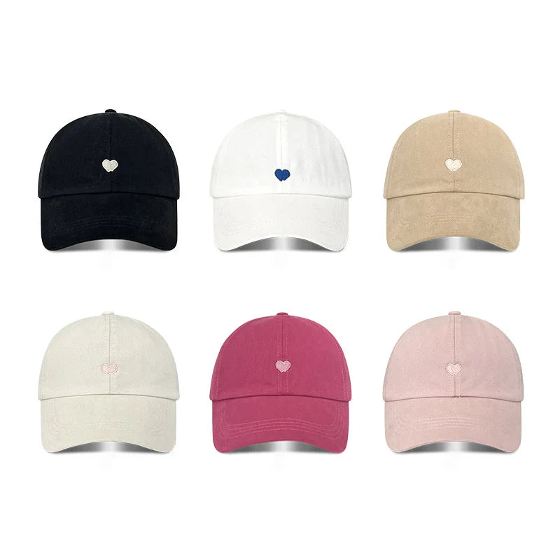 Women's ponytail baseball cap with open rear design and adjustable snapback
