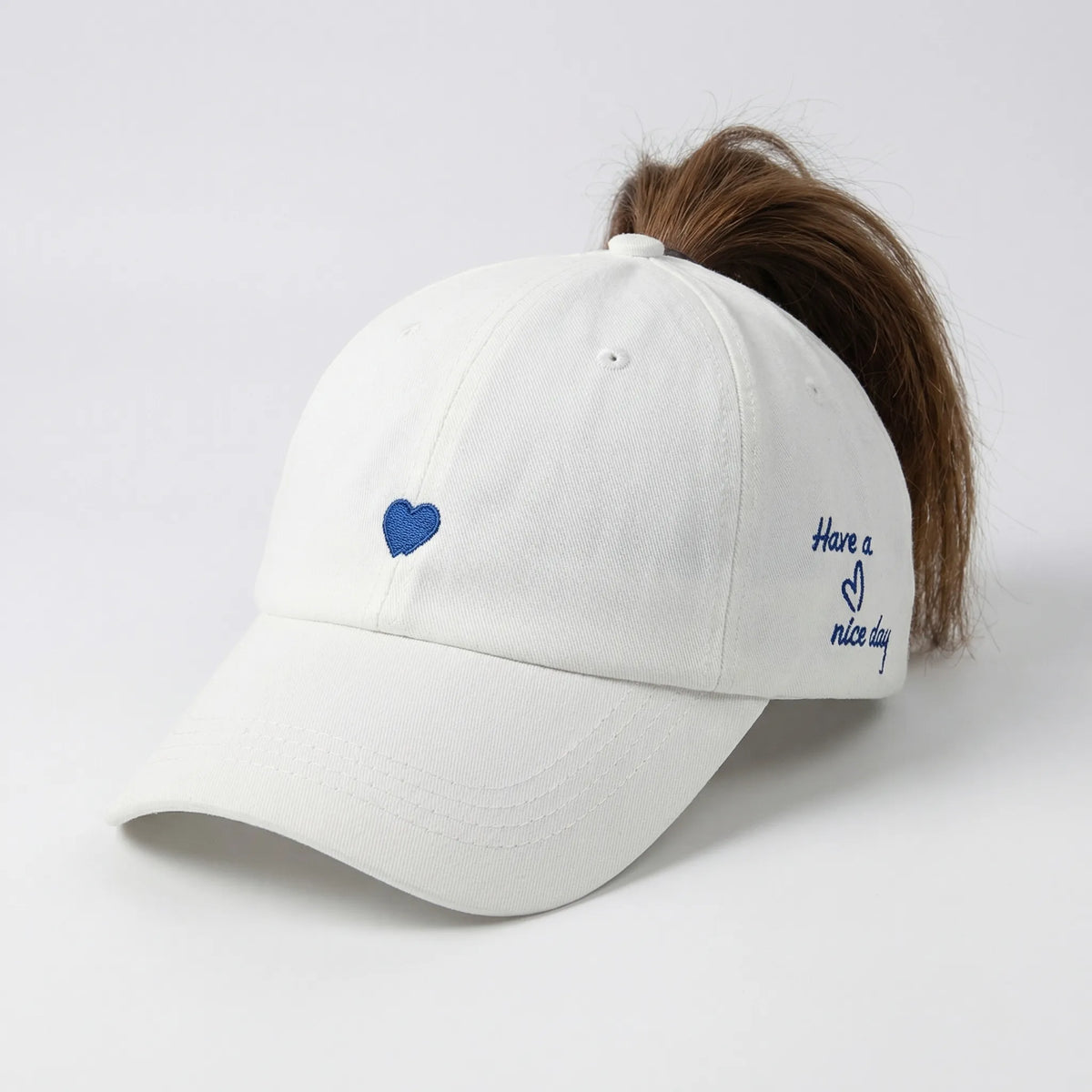 Women's ponytail baseball cap with open rear design and adjustable snapback