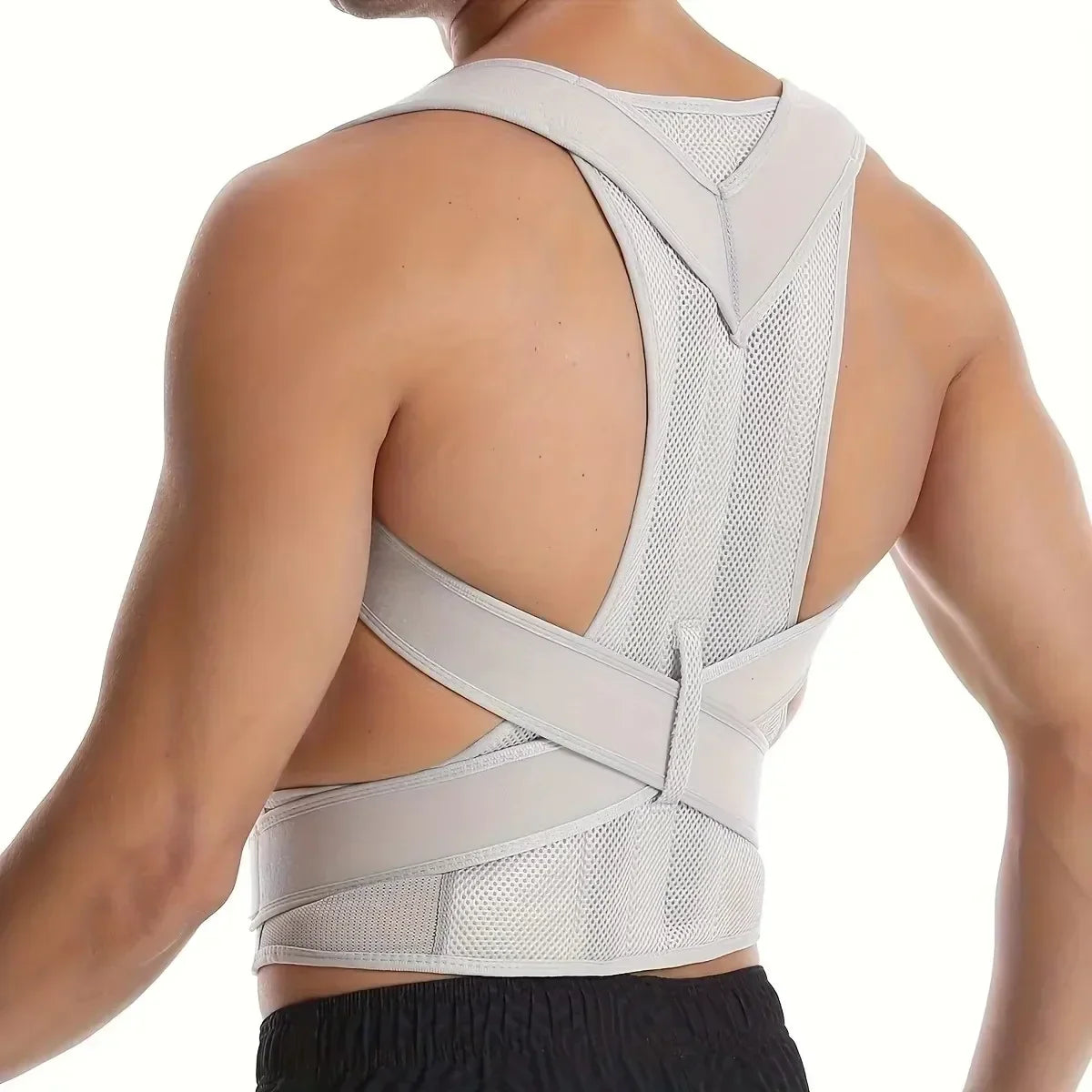 Adjustable unisex posture corrector with breathable mesh panels and lumbar support